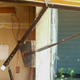 Illustration for article titled Garage Door Hinge Mechanism: Situation Vastly Improved